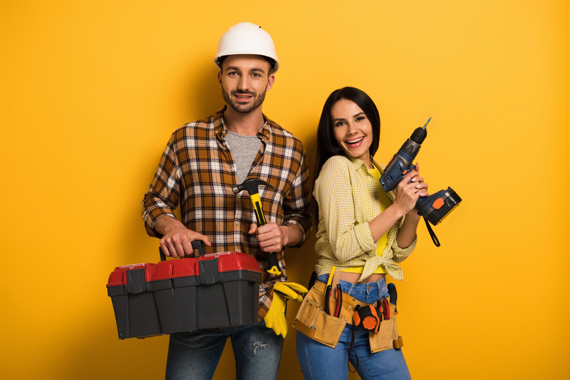smiling-manual-workers-holding-toolbox-and-electri-2024-11-17-17-23-43-utc_11zon.jpg
