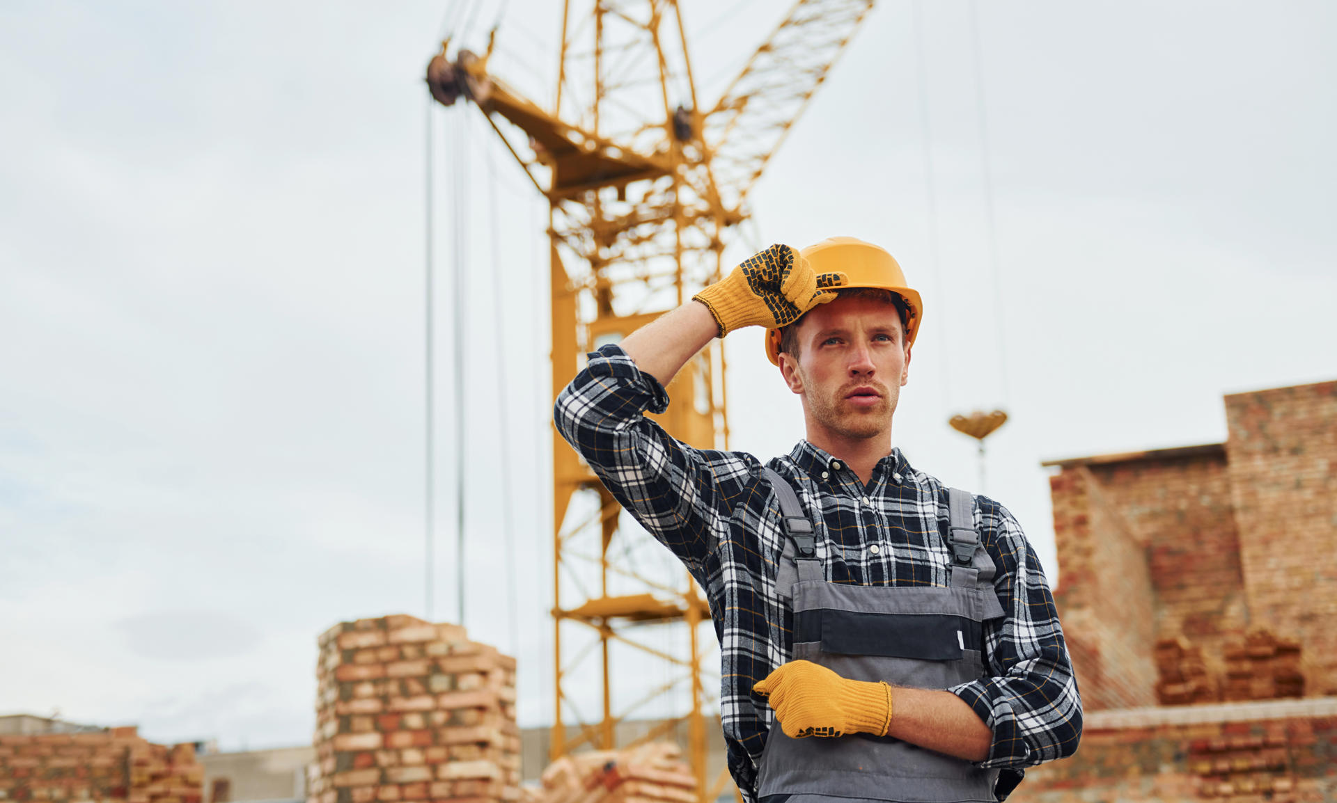 with-arms-crossed-construction-worker-in-uniform-2023-11-27-05-30-36-utc.jpg